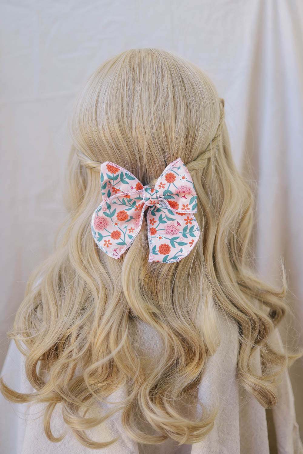Wild Flower Serged Trim Bow with Alligator Style Clip