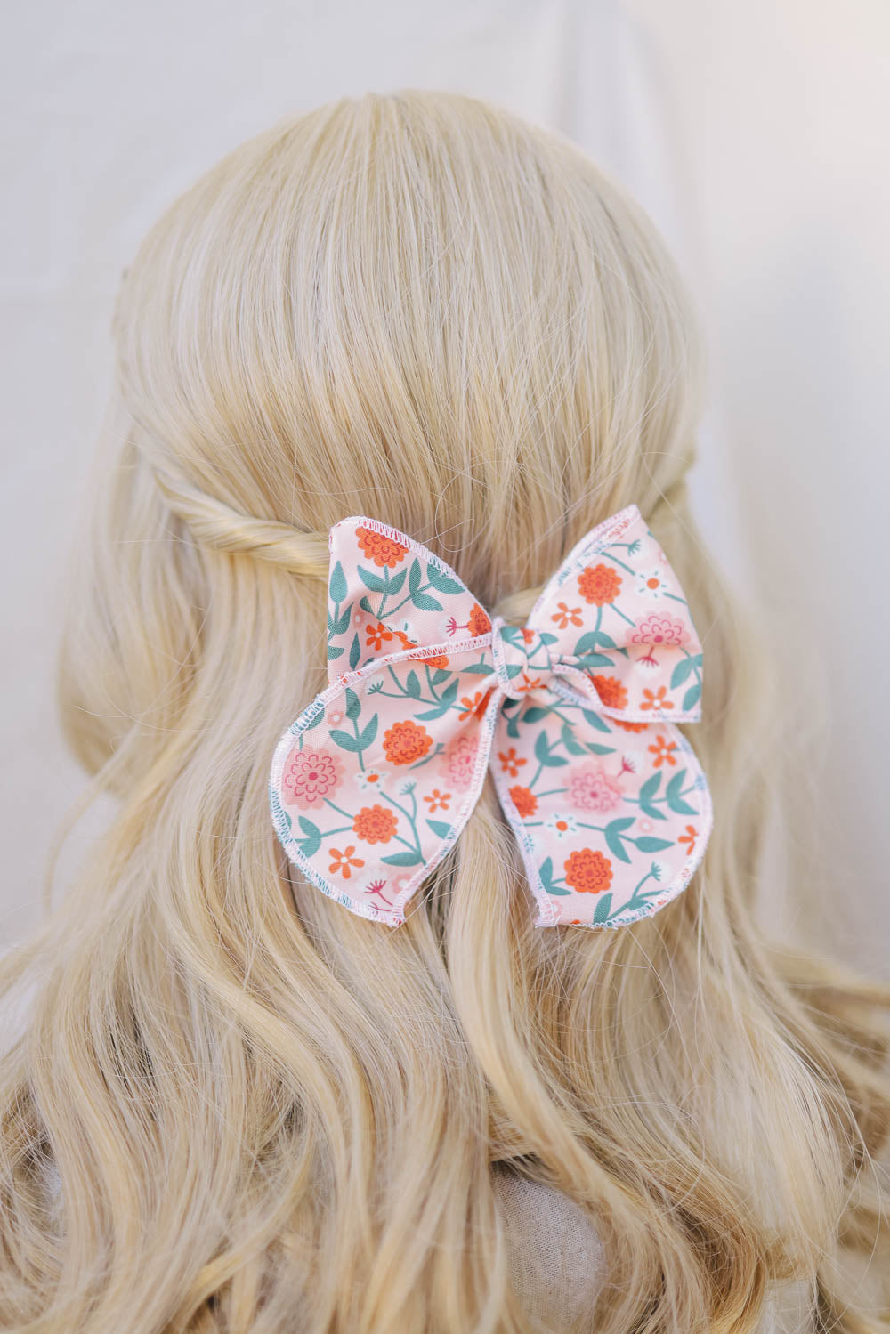 Wild Flower Serged Trim Bow with Alligator Style Clip