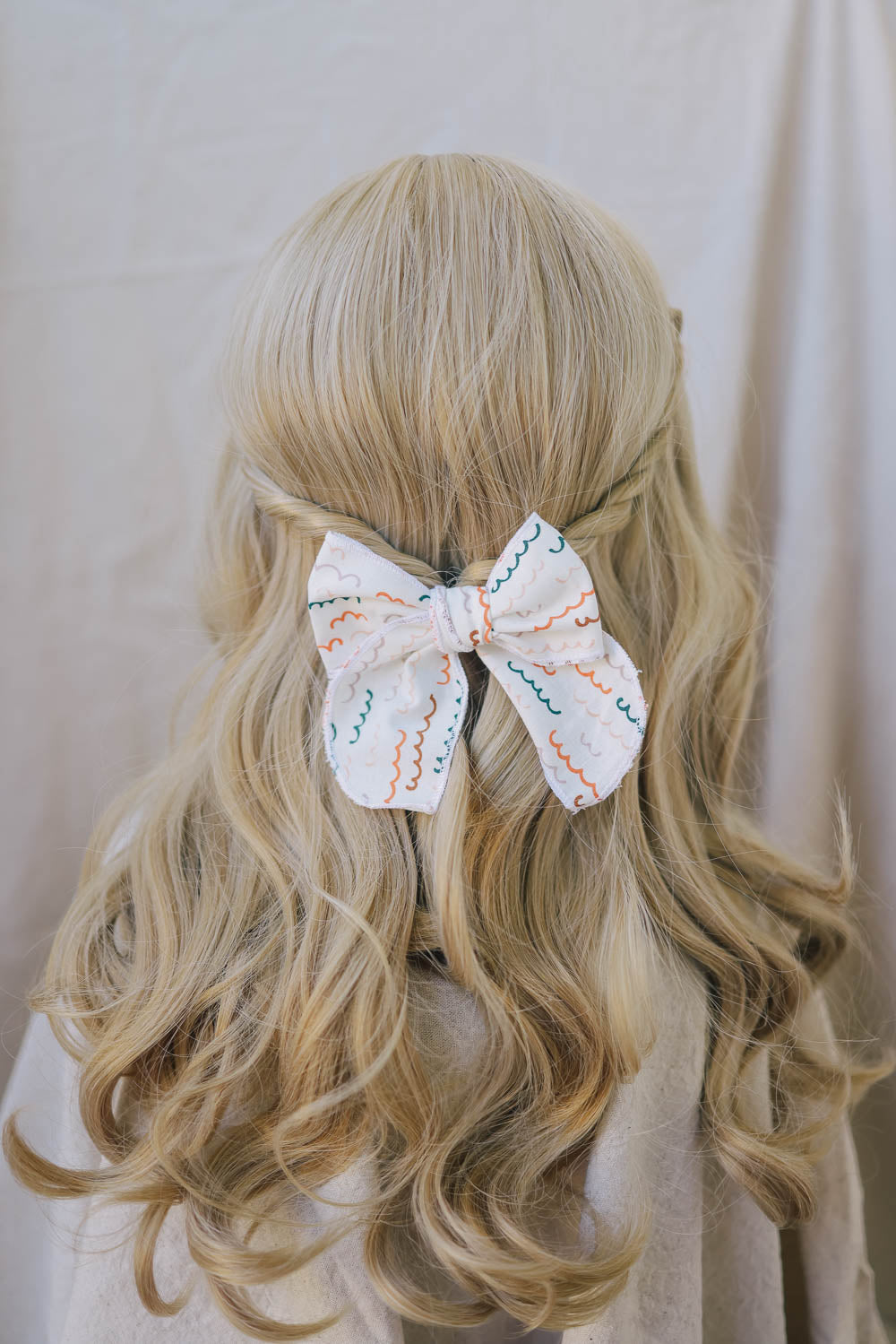 Hand crafted Retro Style Color wave Serged bow with Alligator clip