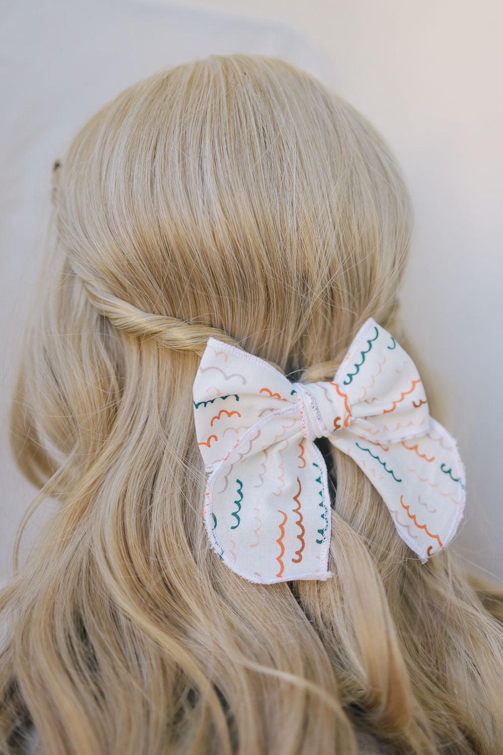 Hand crafted Retro Style Color wave Serged bow with Alligator clip