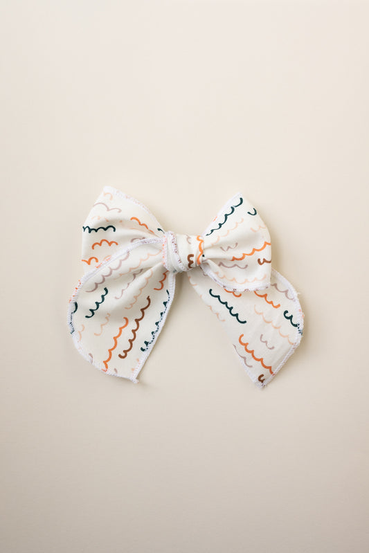 Hand crafted Retro Style Color wave Serged bow with Alligator clip
