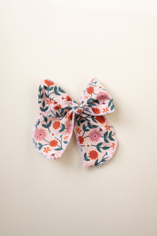 Wild Flower Serged Trim Bow with Alligator Style Clip