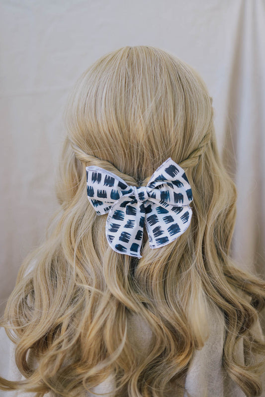 Edgy Black and White Serged Trim Bow with Alligator Clip